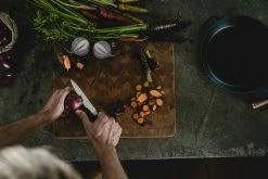 Coupon π Fiskars Norden Paring Knife π€© 12 Coupon π Fiskars Norden Paring Knife π€© -Alessi shop Fiskars Norden Paring knife cutting onion Hero image 1026424